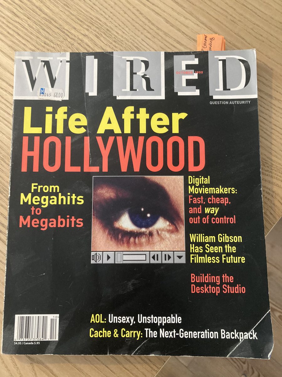 An image of the cover of the October 1999 issue of Wired. The cover-story is Life after Hollywood: From megahits to megabits. An image of an eye in what appears to be a 1999-era Mac based video-player window is in the center of the cover. On the right it says: Digital Moviemakers: Fast, cheap, and way out of control, William Gibson has seen the filmless future and Building the desktop studio. At the bottom of the page it says: AOL: Unsexy. Unstoppable, and Cache & Carry: The Next Generation Backpack. In the top right it says: Question Auterity. The magazine is worn. There is a price sticker from Narvesen that says: 68.00-